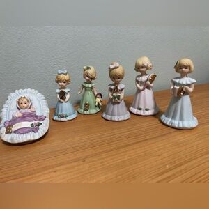 Enesco Growing up Girls birthday porcelain doll collection.